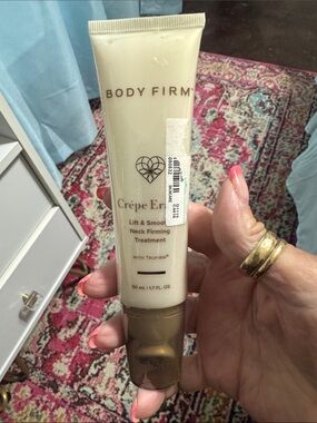 Body Firm Crêpe Erase Neck Treatment with Trufirm Roller ball application— Cream